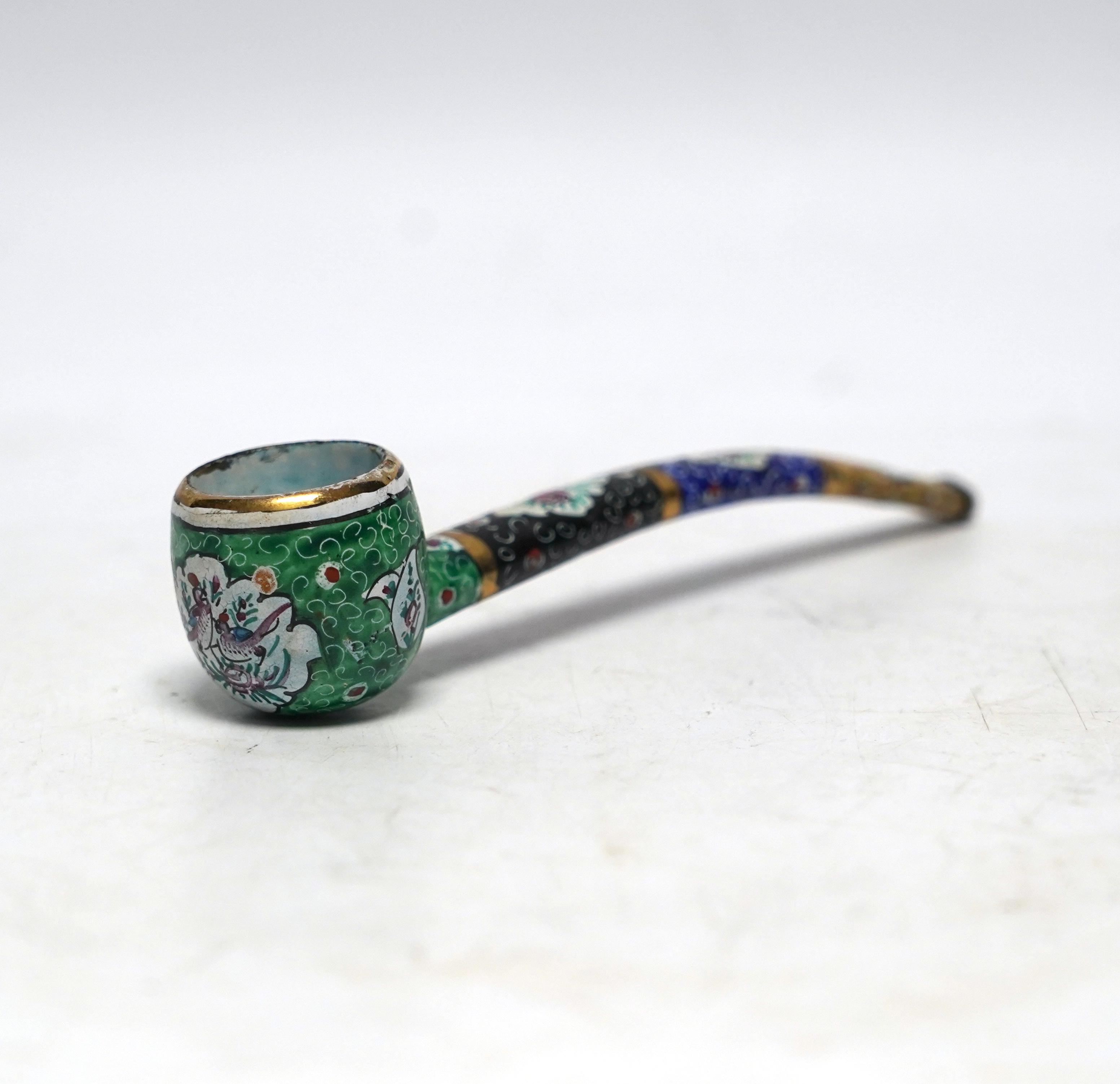 A Persian multicoloured enamelled pipe, 14cm long